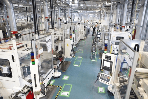 Top view of a warehouse with machineries